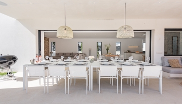 Resa estate modern villa for sale ibiza first line north outdoor dining.jpg